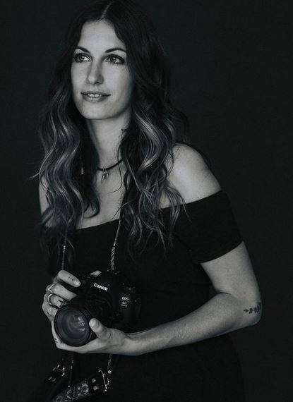 THE WOMAN BEHIND THE CAMERA